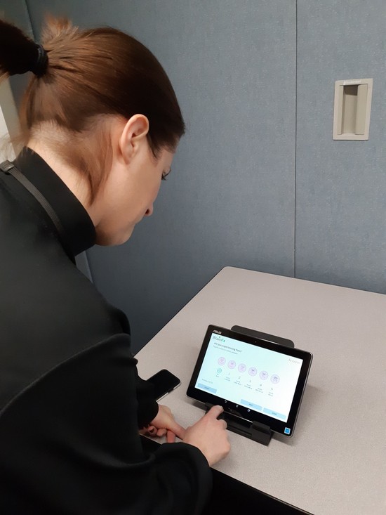 image of lady working on tablet